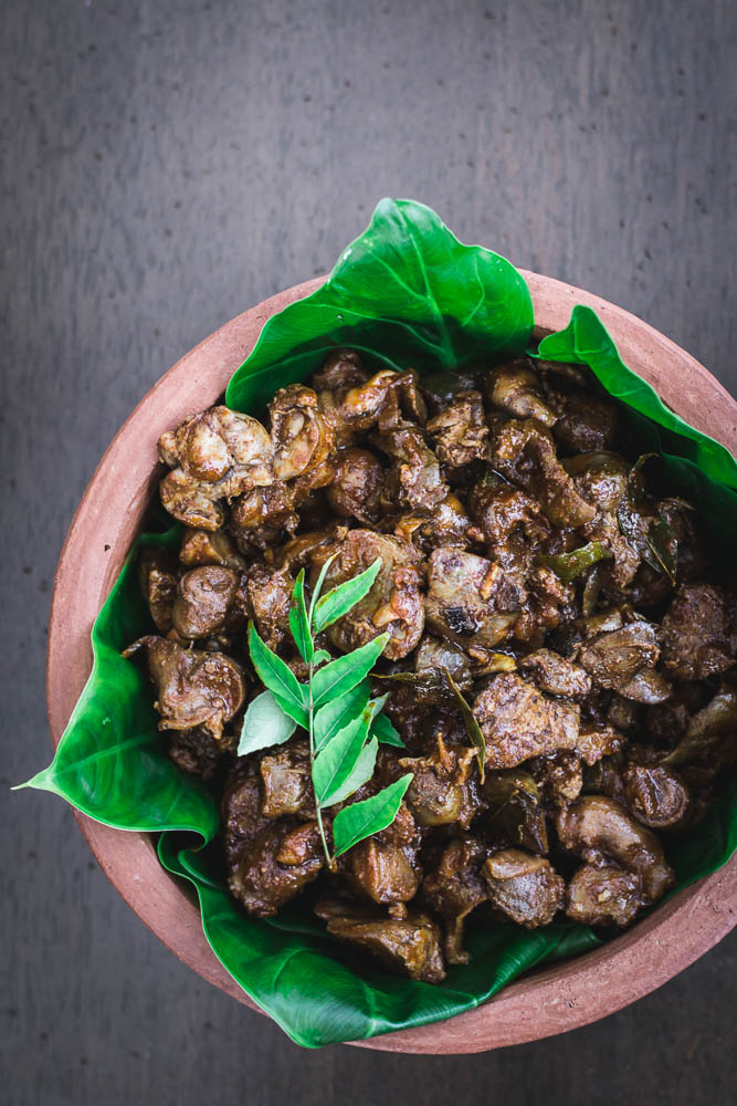 Chicken offal fry in earthenware pot