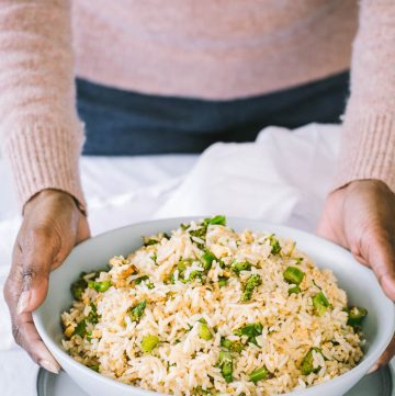 Egg broccolini rice in blue bowl