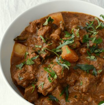 Indian beef curry in white bowl