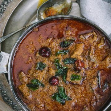 Beef Madras curry in silver bowl