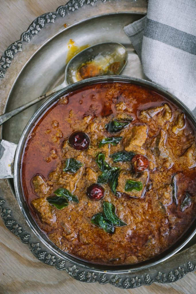 Beef Madras curry in silver bowl