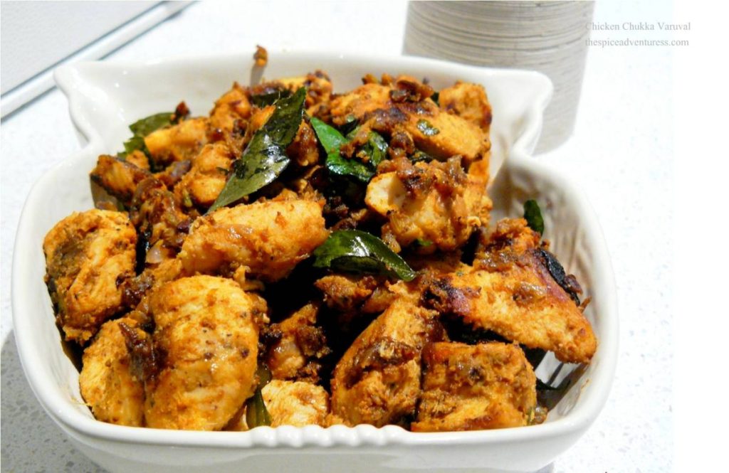 Indian chicken fry with curry leaves and spices