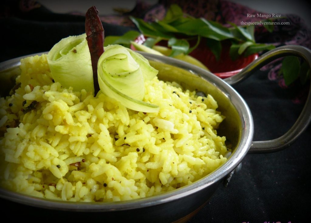 Raw mango flavoured rice served in bowl