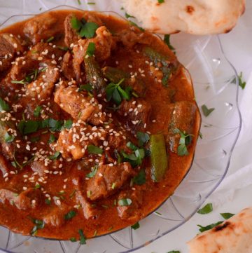 Lamb and okra curry with flatbread on the side