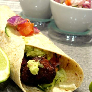 Fried chicken wrap with avocado and salad