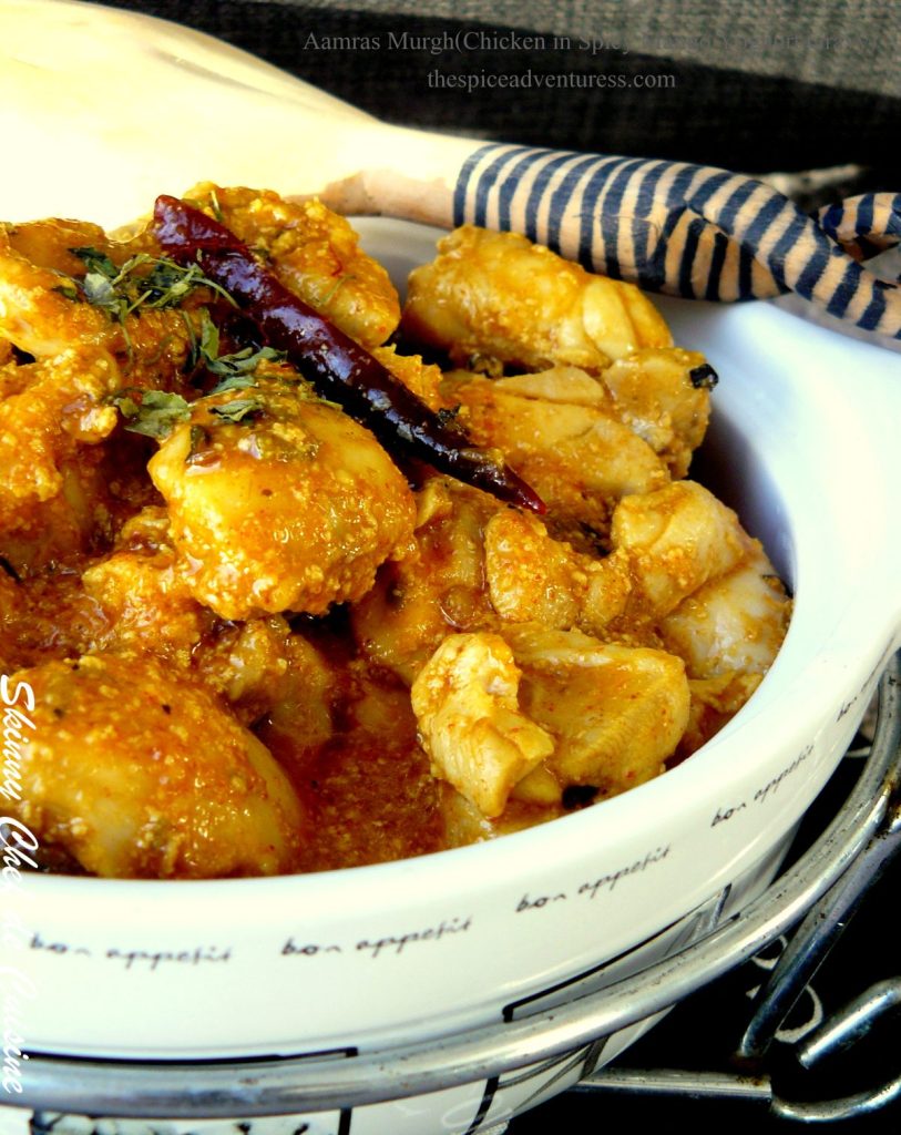 Indian chicken curry in white bowl