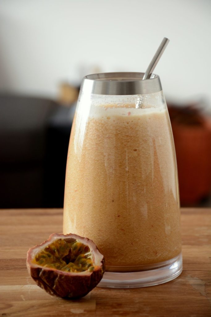 Apple and passionfruit smoothie in jar