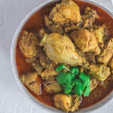 Indian chicken curry in grey bowl