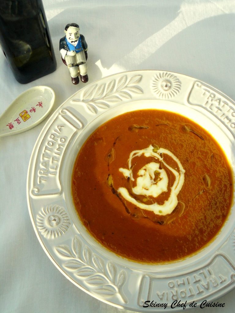 Roasted capsicum soup in white bowl