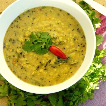 Indian style lentil curry in white bowl