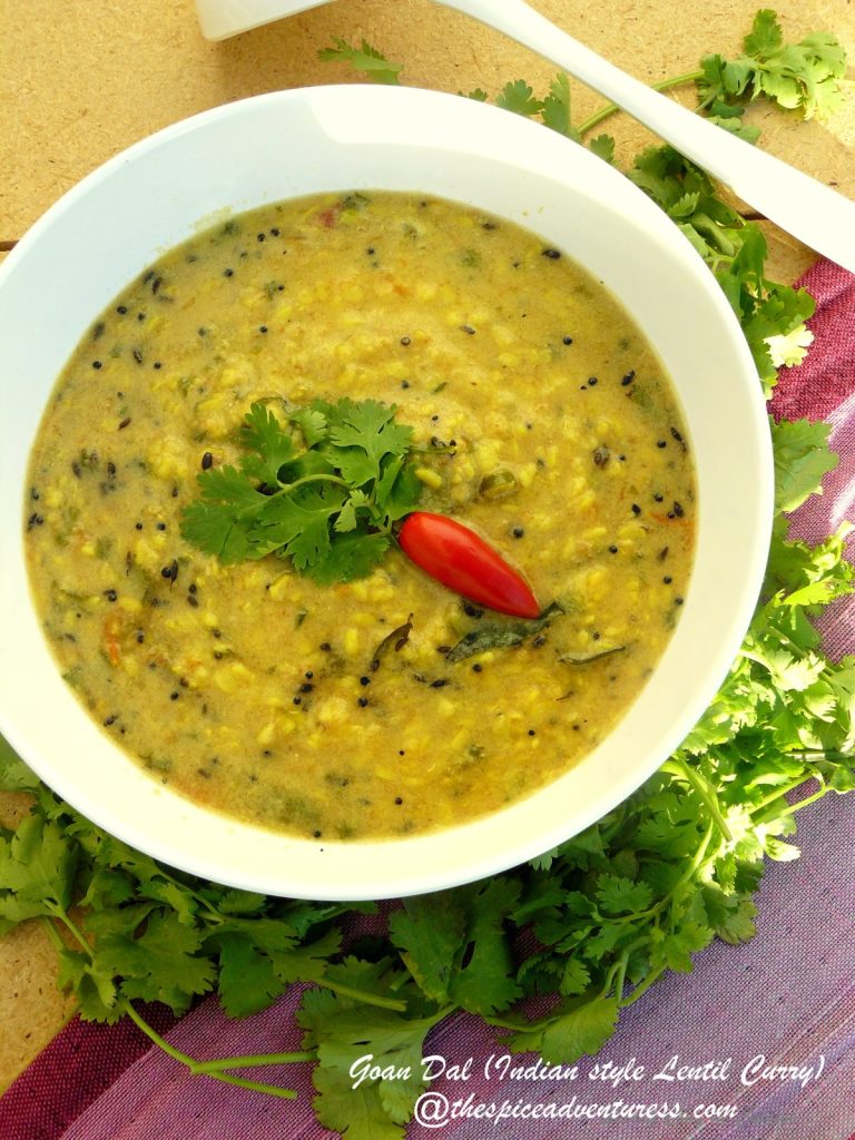 Indian style lentil curry in white bowl