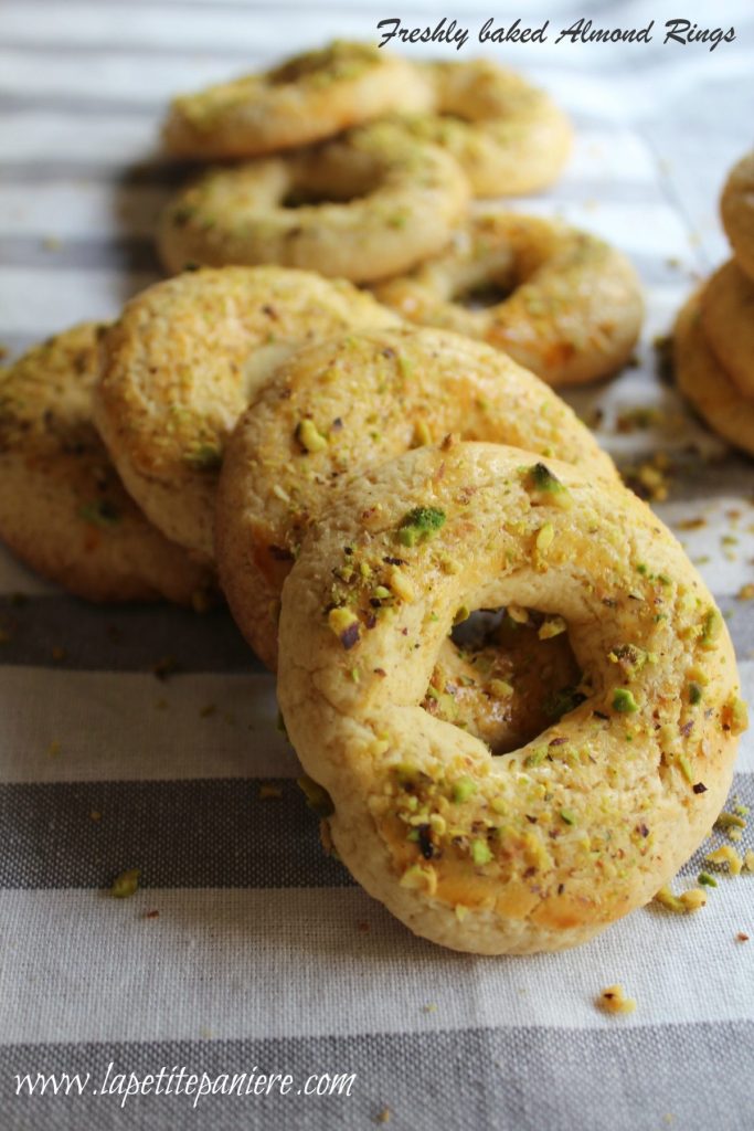 Baked almond rings on tea towel