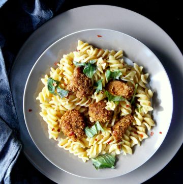 Pasta with fried chicken served in grey bowl