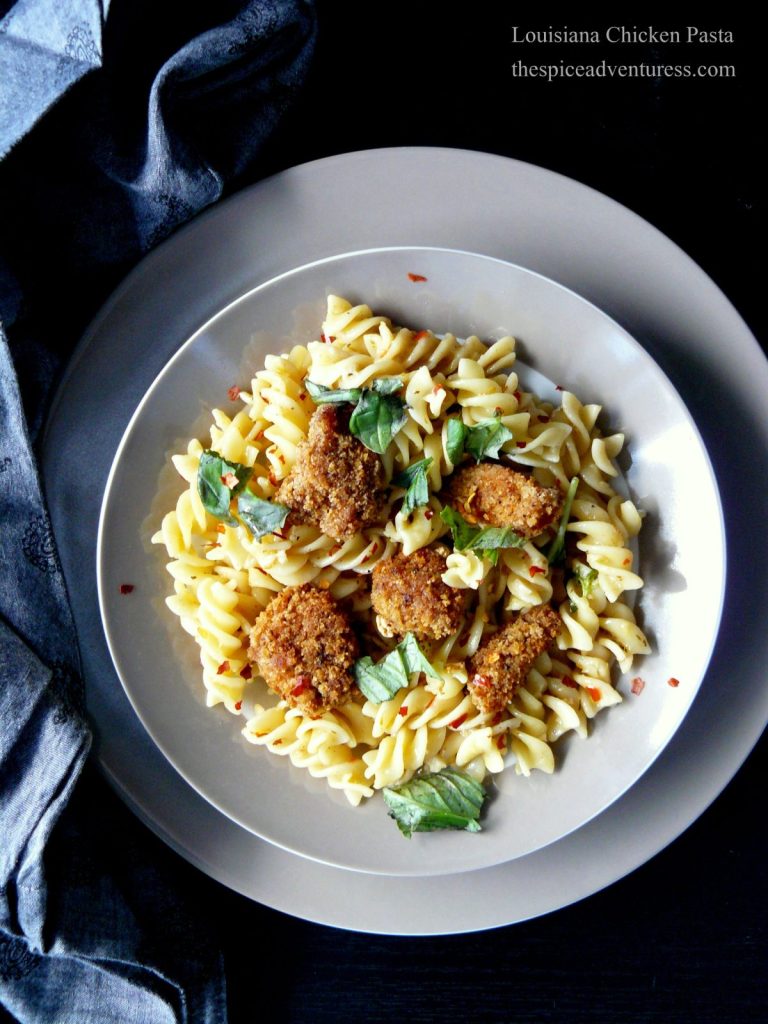 Pasta with fried chicken served in grey bowl