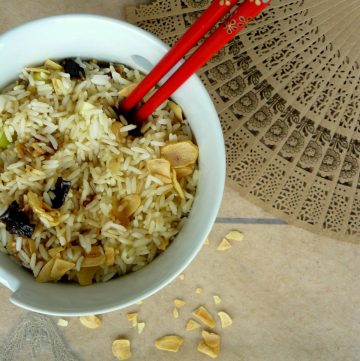 Rice with garlic and chilli in white bowl