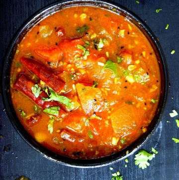 Indian style watermelon curry in black bowl