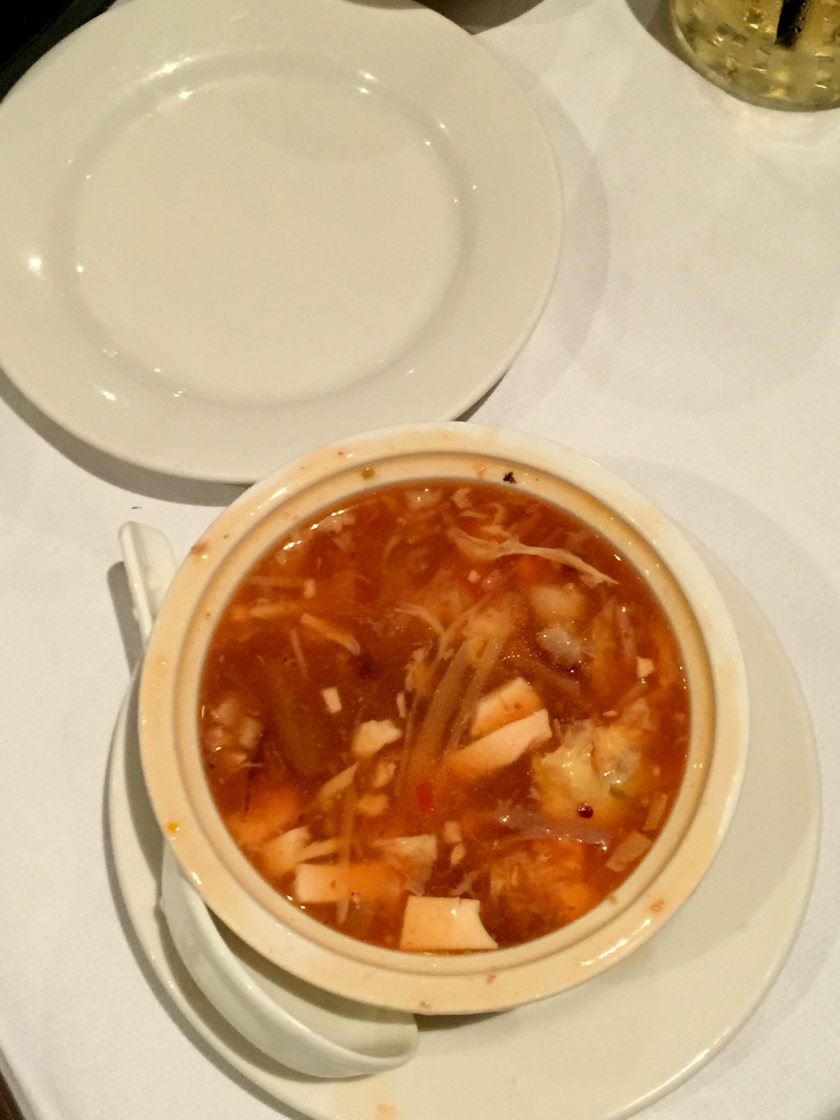 hot and sour soup with Chinese mushrooms, bamboo shoots, shredded bbq pork, fungus and hot spices