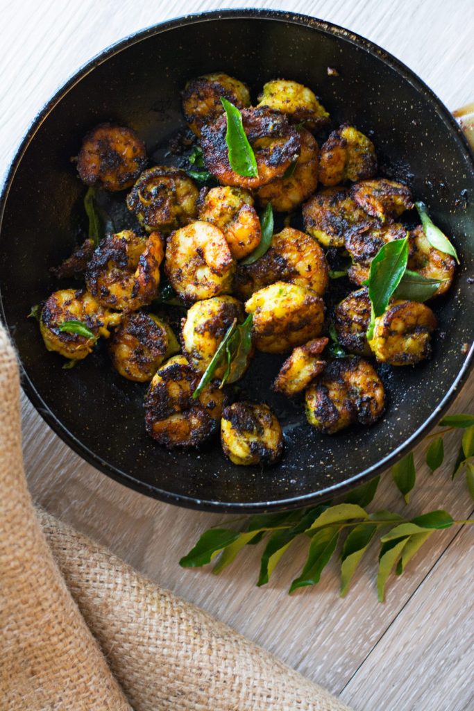 Fried spicy prawns served in black pan