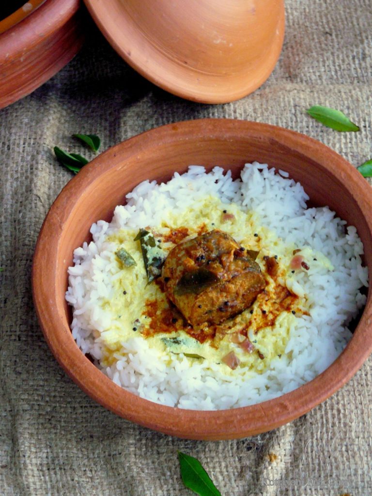 Kerala style fish curry served over rice