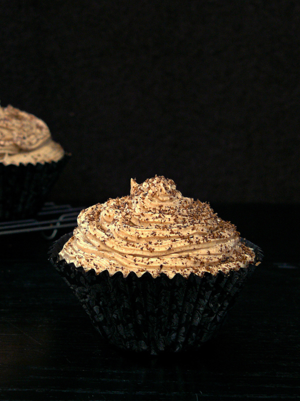 close up of chocolate cupcake with buttercream