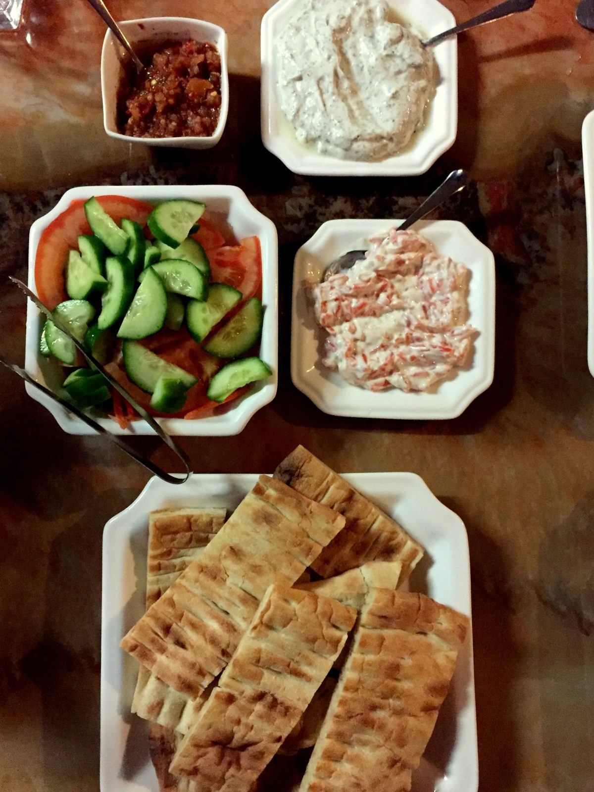 Afghan bread, dips, salad and condiments