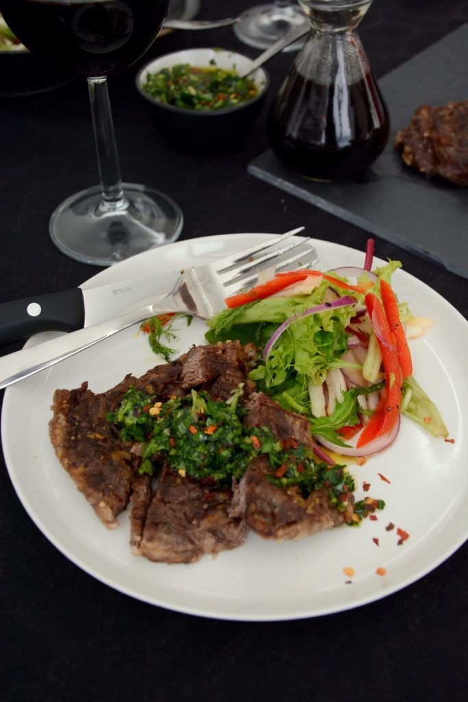 Grilled beef steak, chimichurri, mixed salad