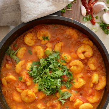 Prawns curry garnished with coriander leaves