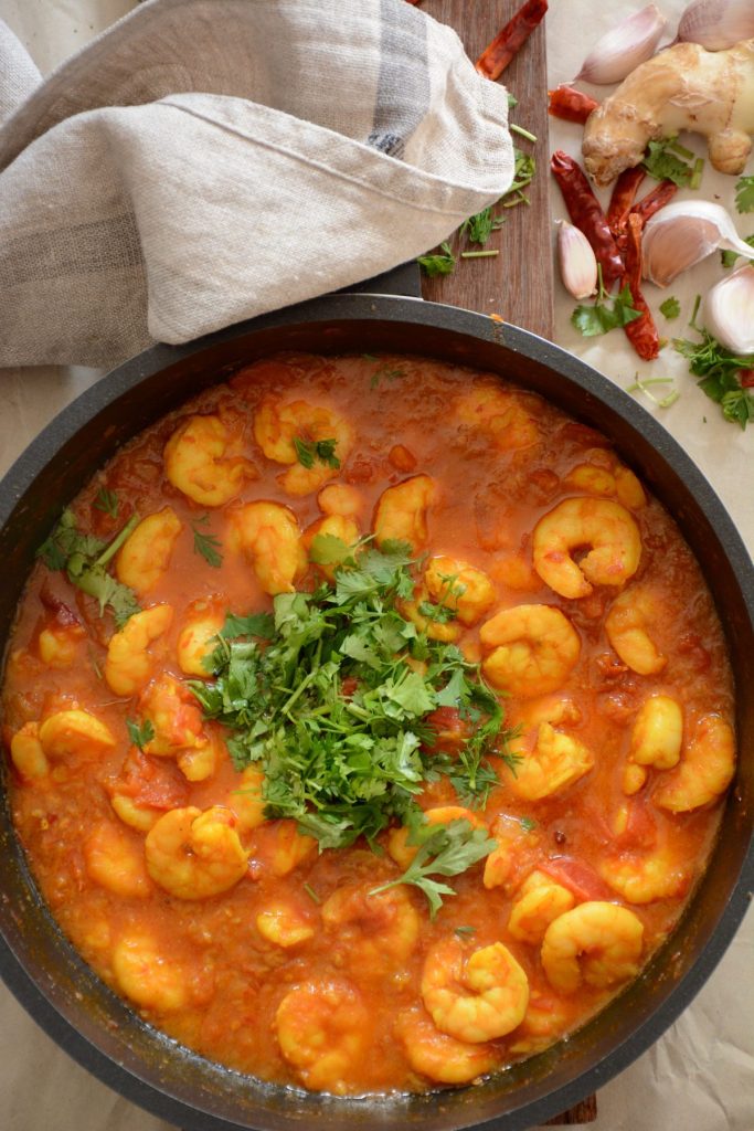 Prawns curry garnished with coriander leaves
