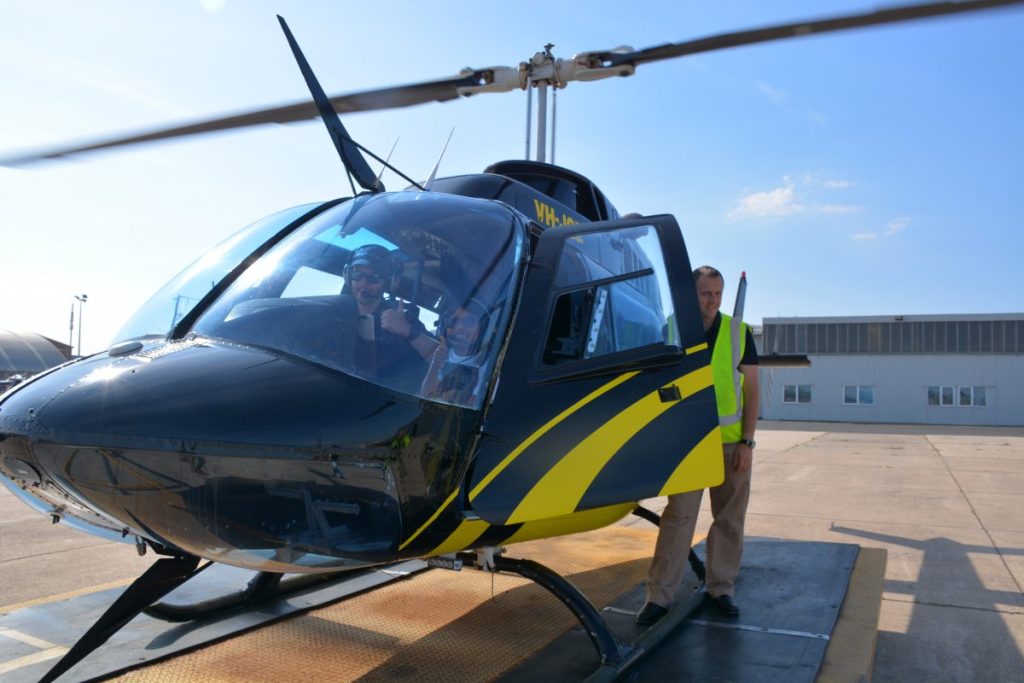 People inside a helicopter