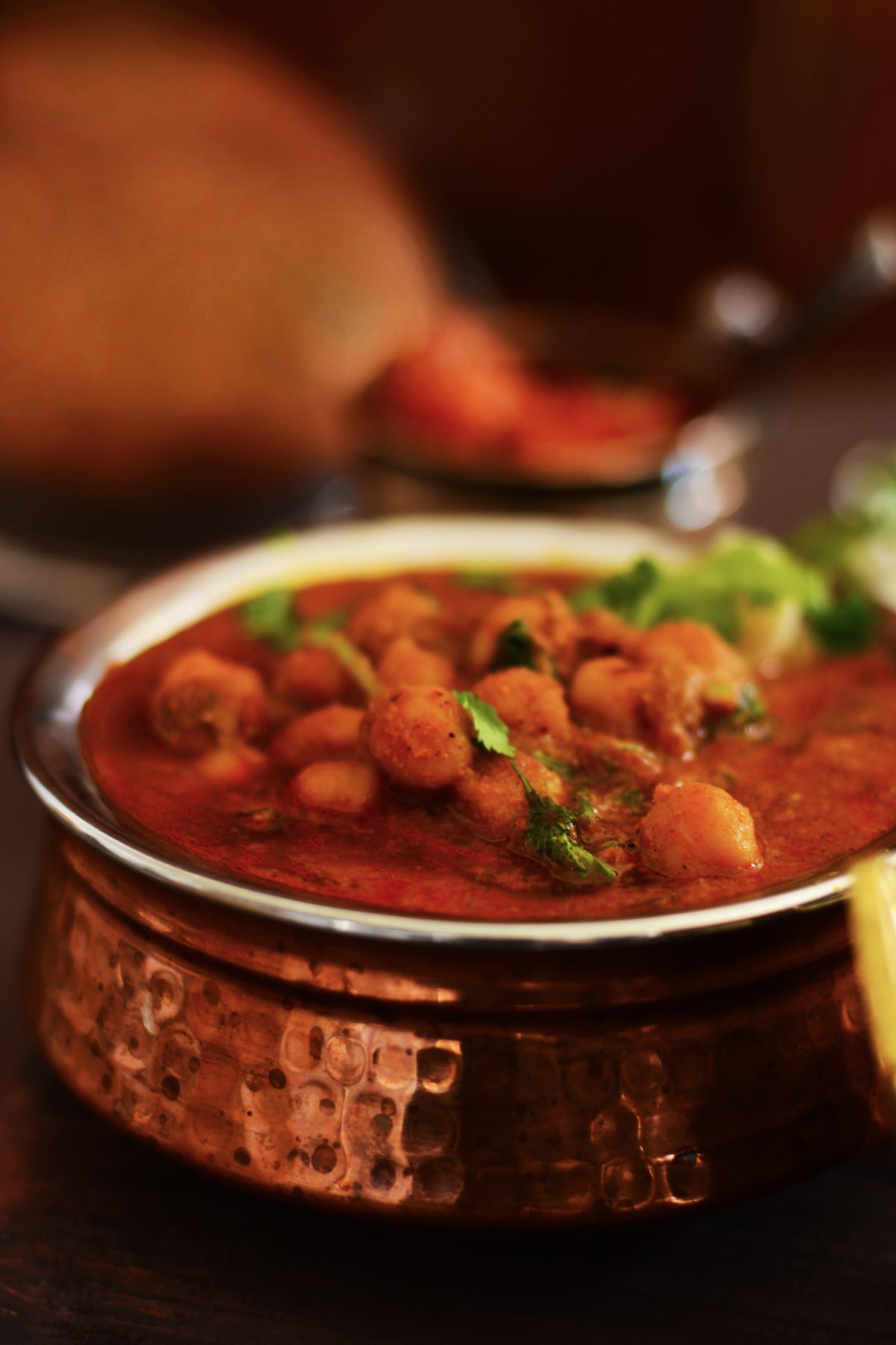 Chickpeas and Mustard Leaves Curry (with East Indian Bottle Masala) - a comforting, nourishing chickpea curry with the goodness of homegrown mustard leaves - thespiceadventuress.com