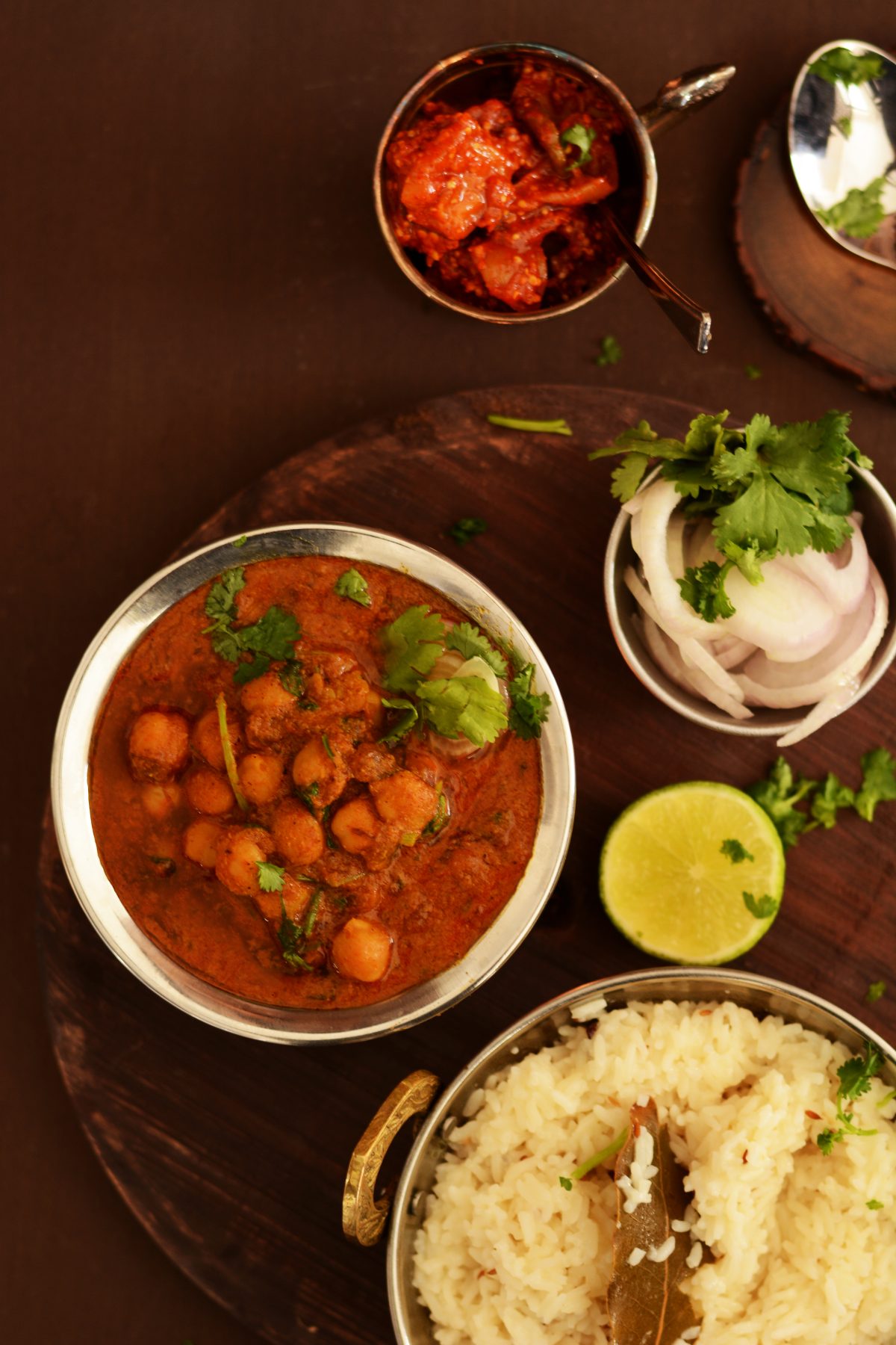 Chickpeas and Mustard Leaves Curry (with East Indian Bottle Masala) - a comforting, nourishing chickpea curry with the goodness of homegrown mustard leaves - thespiceadventuress.com