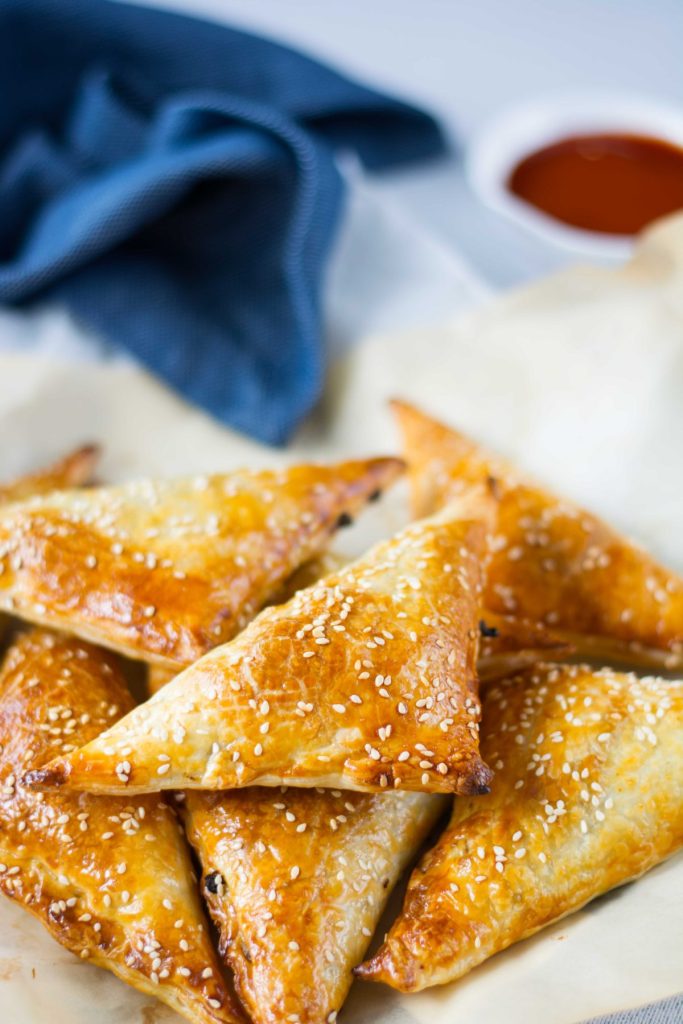 Baked kangaroo mince in puff pastry shaped like triangles