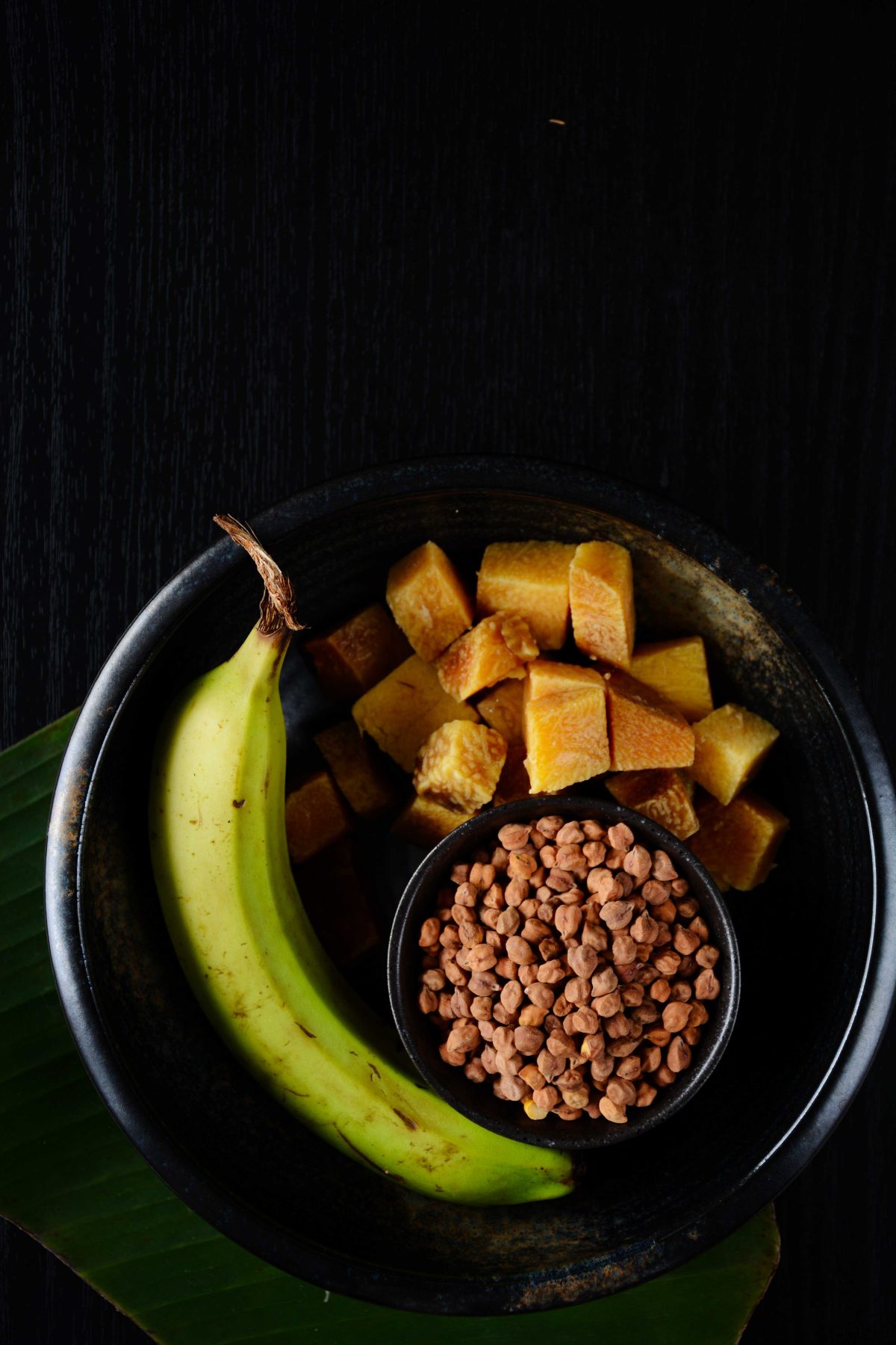 Kootu Curry (Kerala style Black Chickpeas, Plantain and Yam Curry with Coconut and Peppercorns) - thespiceadventuress.com