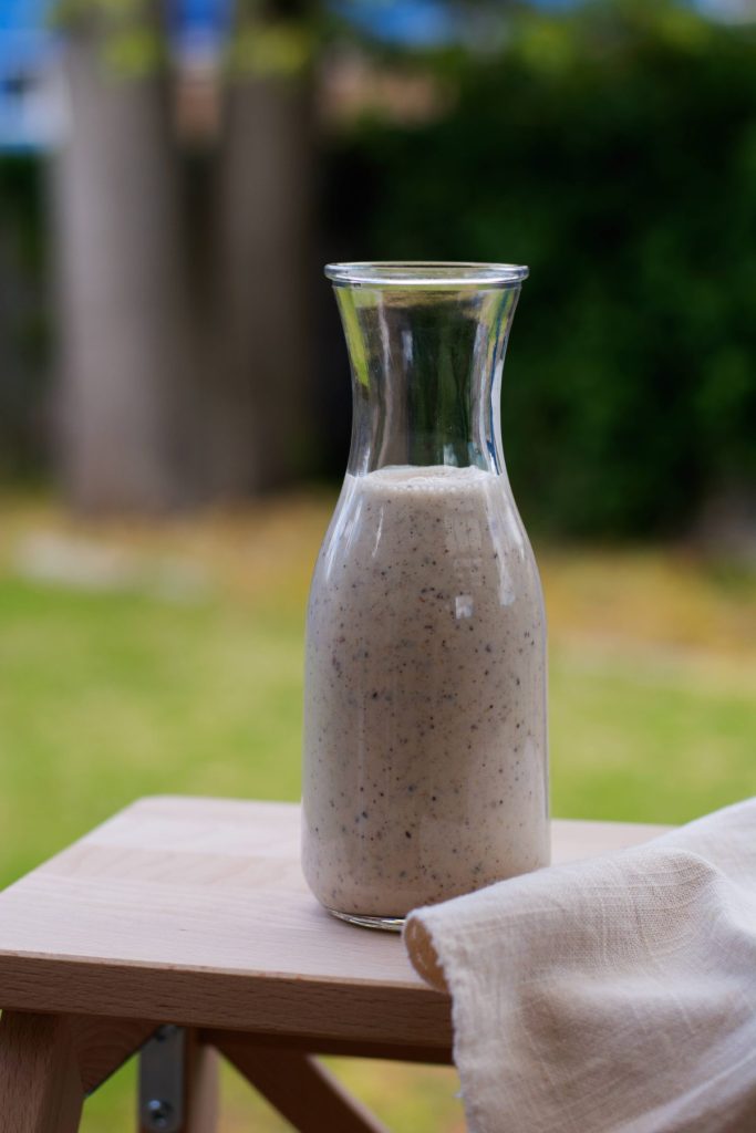 A glass jar with smoothie