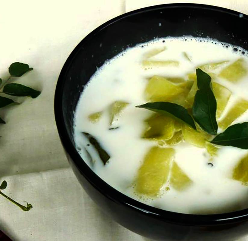 Olan (Wintermelon with Coconut Milk) - a part of the vegetarian Onam sadya - thespiceadventuress.com