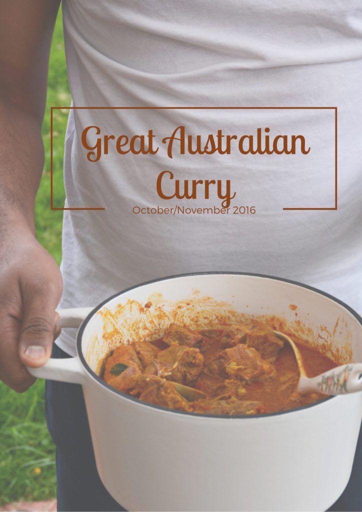 Man holding a pot of goat curry