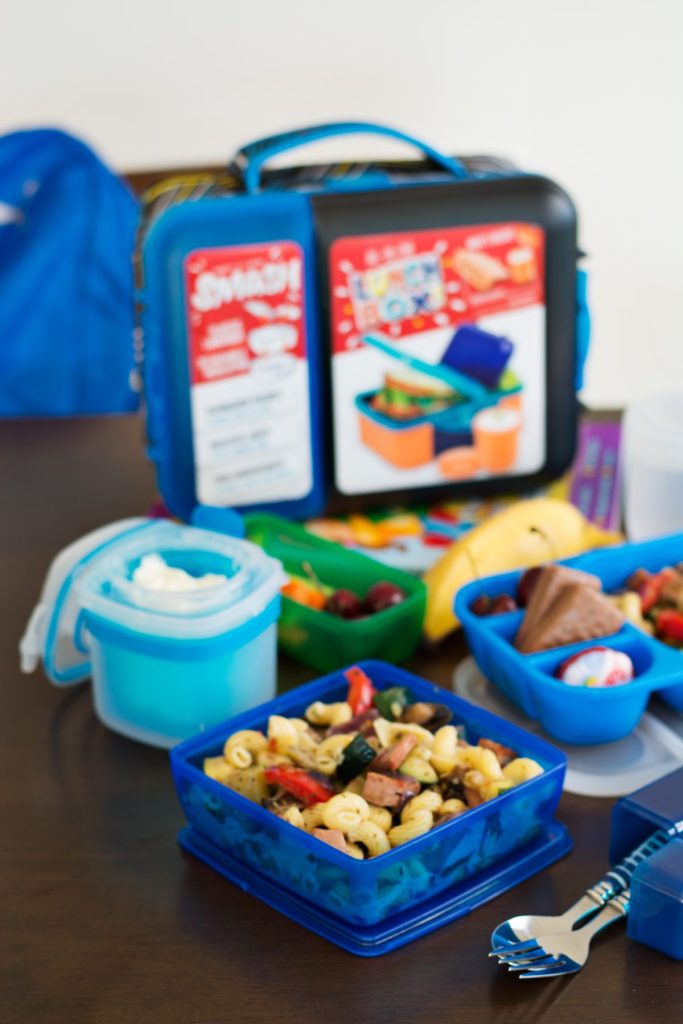 Blue lunch box set with food