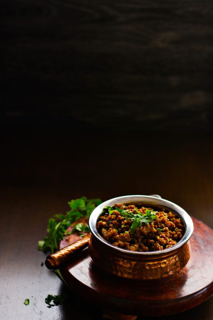 Indian fenugreek seed stir fry served in copper pot