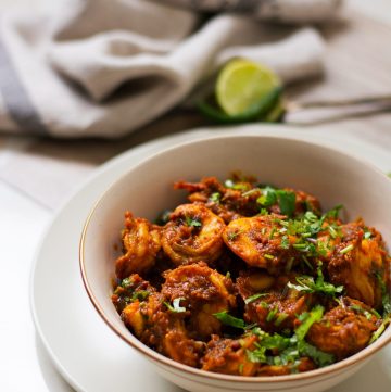 Indian style prawns dish in a cream coloured bowl