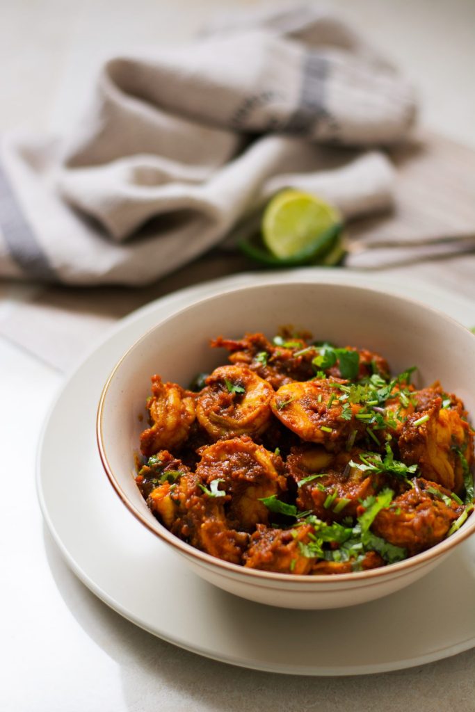 Indian style prawns dish in a cream coloured bowl