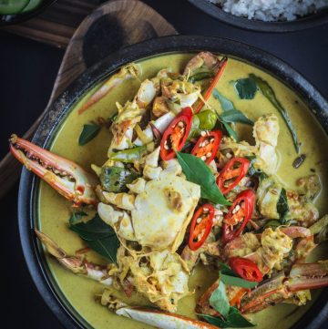 Fiji style crab curry in black bowl
