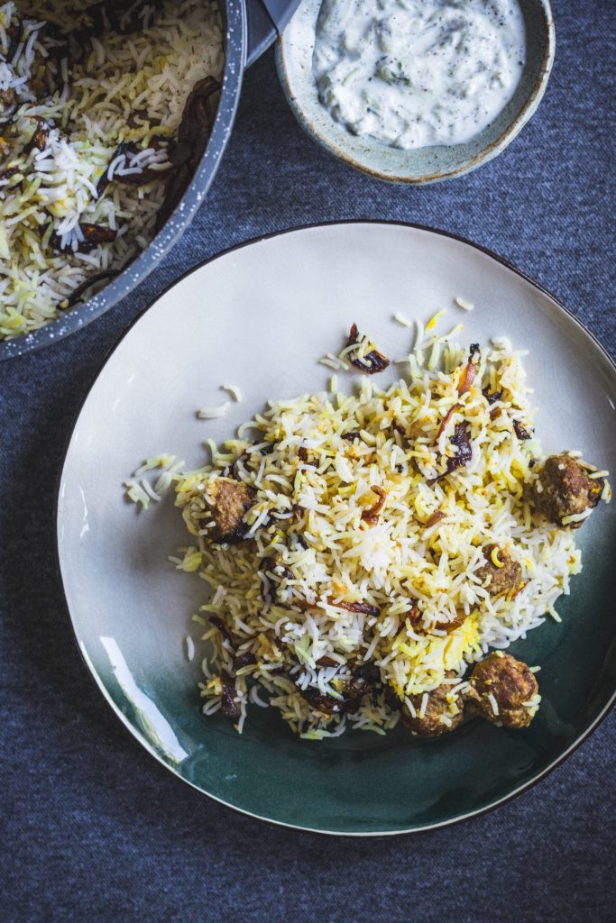 Lucknow style kofta pulao on white plate