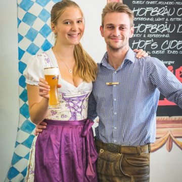 man and woman holding beer