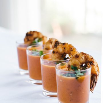 Tomato soup shots with grilled prawns on the side