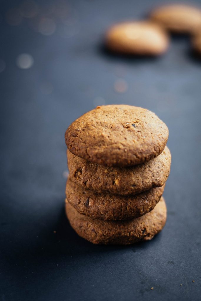 a stack of dates and cashewnut cookies