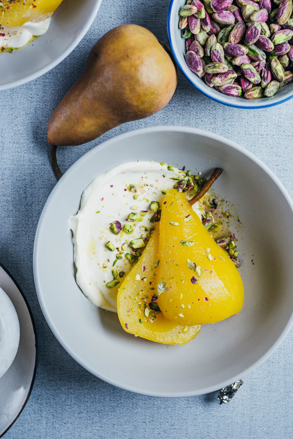 Poached Pears (with Cardamom, Saffron and Pistachios) - thespiceadventuress.com