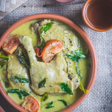 Duck curry in terracotta bowl