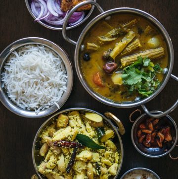 a selection of 6 Indian dishes served in individual bowls
