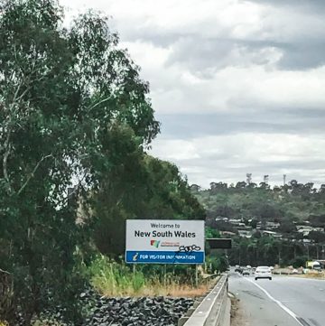 road sign saying welcome to NSW