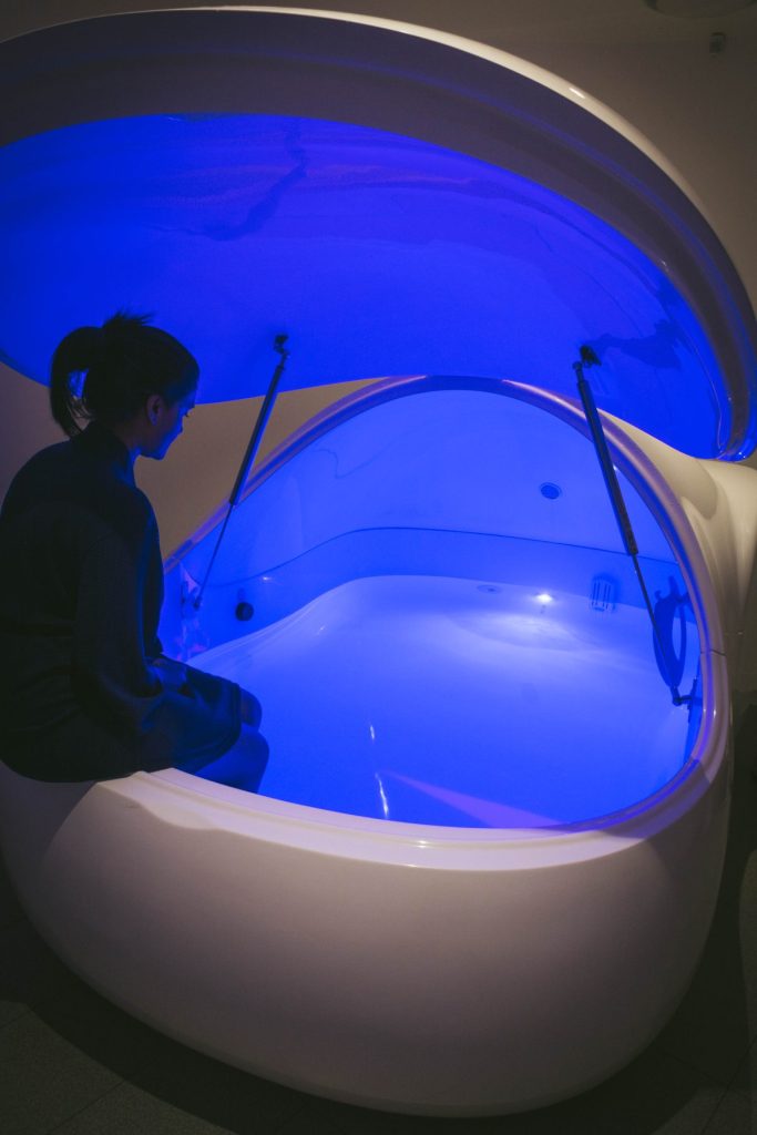 woman in floatation therapy tub